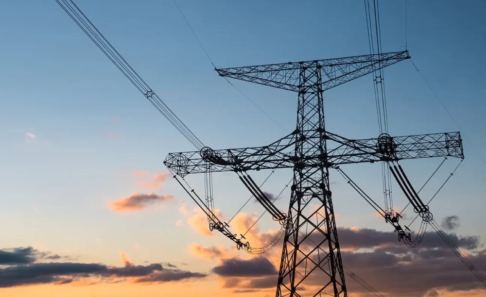 power-transmission-tower-with-sunset-glow-2026-03-18-04-48-28-utc energy line
